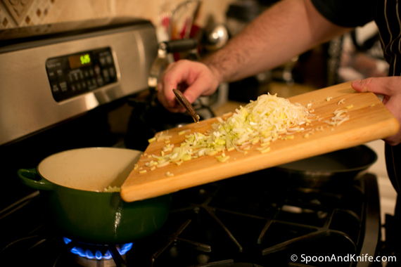 Adding the leeks so they can sweat down