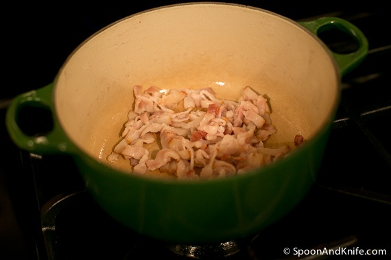 Cooking down the bacon for the leeks