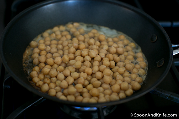 Toasted chickpeas toasting in the butter