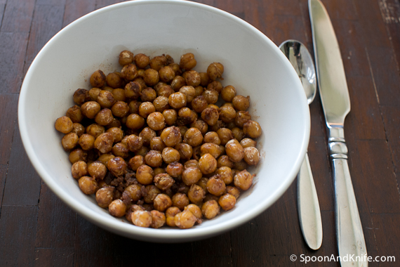 Toasted chickpeas from spoon and knife