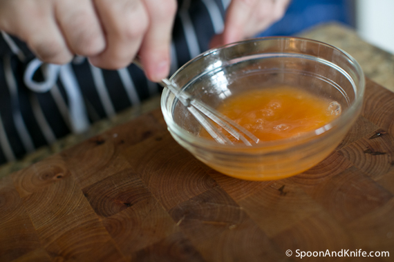 whisking the citrus juice together for the flounder ceviche