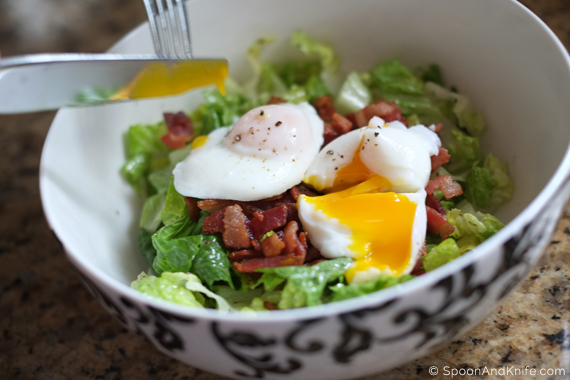 Cutting the Poached Egg on the Salad