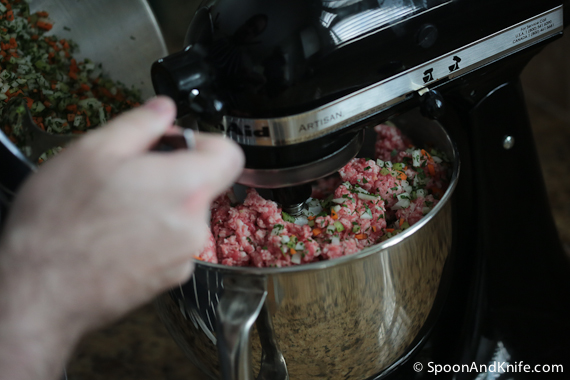 Adding the vegetables to the gluten-free meatloaf recipe