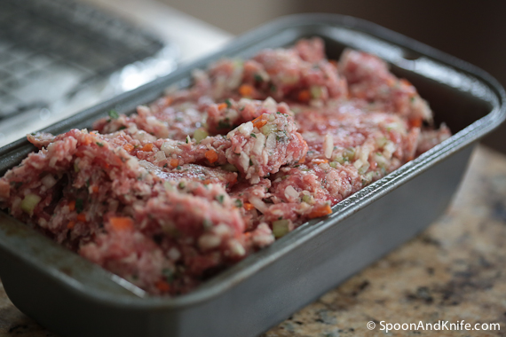 Forming the gluten-free meatloaf with bacon